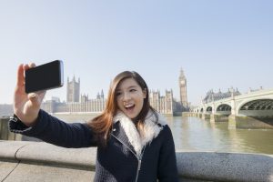 Young woman taking a self portrait